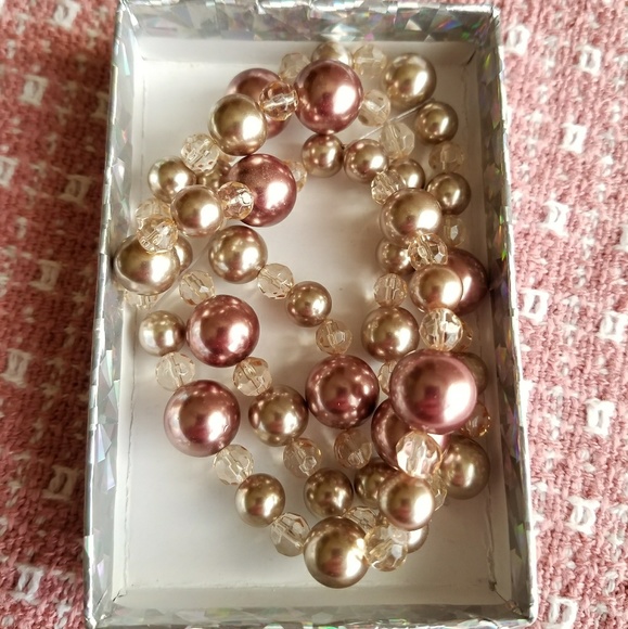 Jewelry - HP! Stretch bracelet in pink and rose gold colors